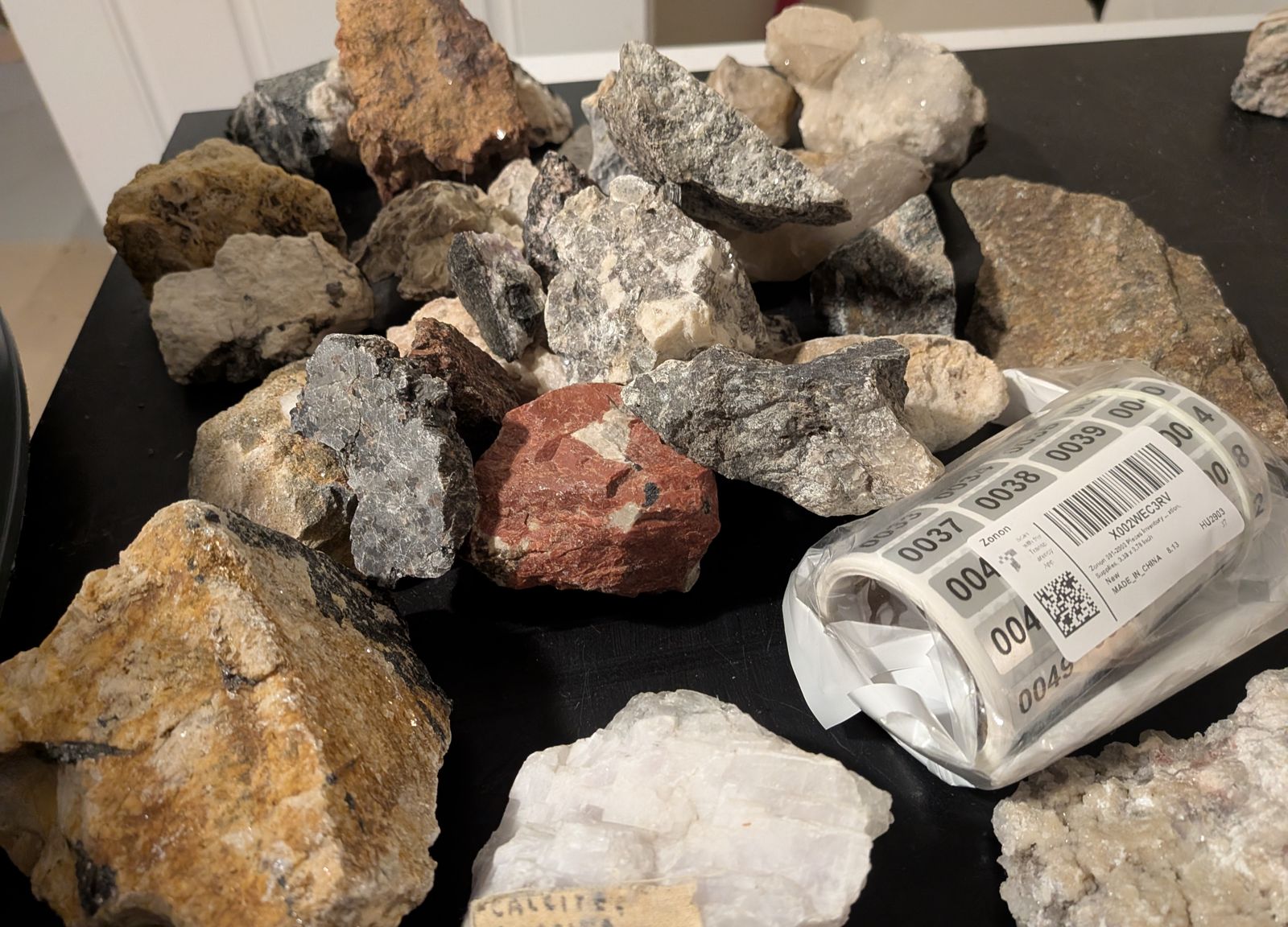 Specimens with a roll of numbered labels